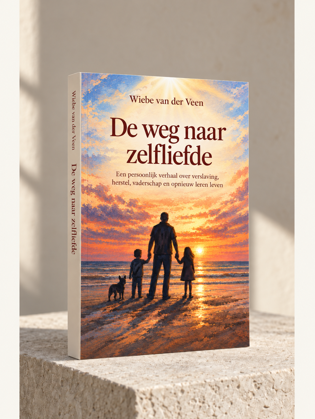 De weg naar zelfliefde van Wiebe van der Veen: een rechtopstaand boek op een lichte stenen ondergrond.